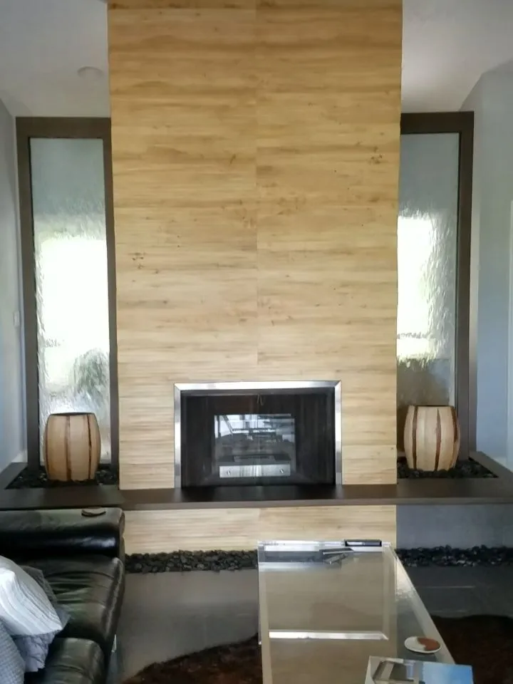 Modern fireplace surround with light wood-look tile